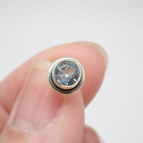 Sterling Silver Faceted Round Blue Topaz Studs