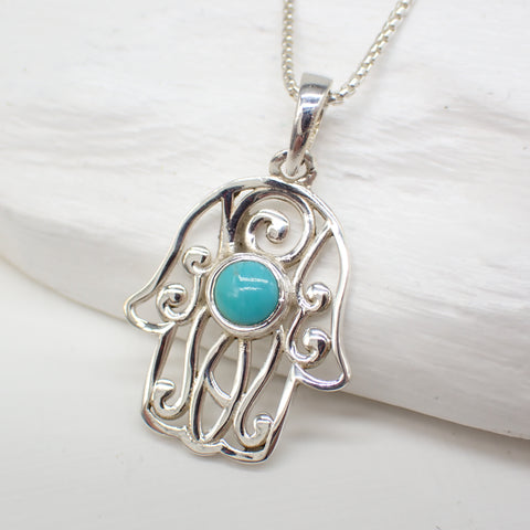 Charm de mano de Hamsa en plata de ley y turquesa