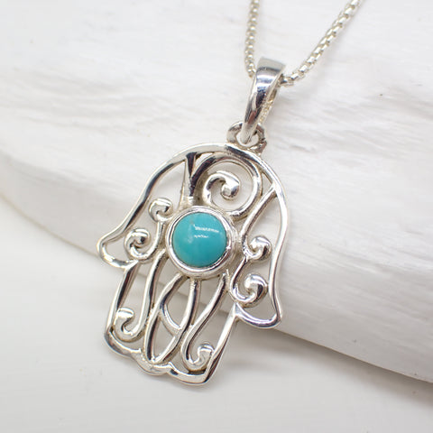 Charm de mano de Hamsa en plata de ley y turquesa