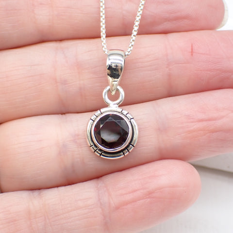 Sterling Silver Round Faceted Garnet Pendant