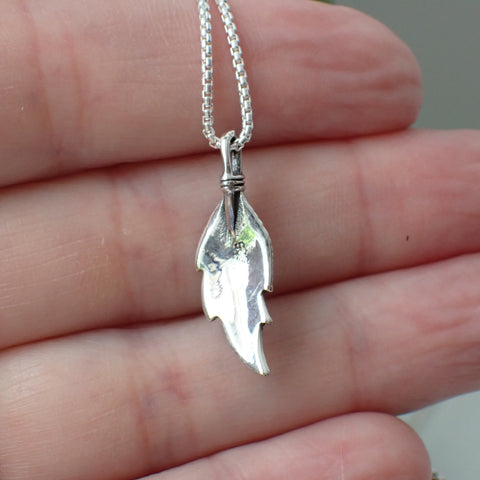 sterling silver feather charm with turquoise