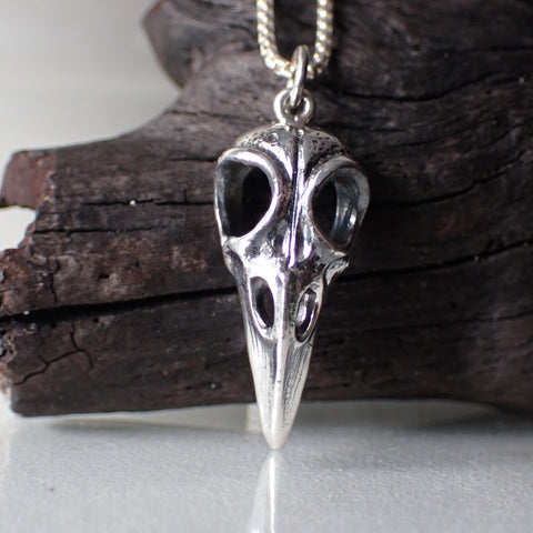 Sterling silver raven skull necklace