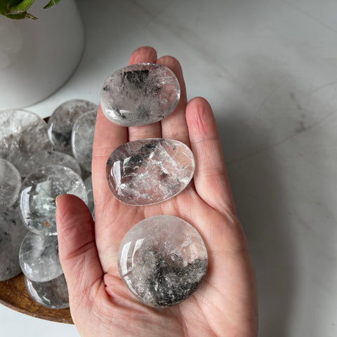 CLEAR QUARTZ WITH GRAPHITE WORRY POCKET STONE